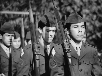 ON TWO FRONTS: LATINOS AND VIETNAM